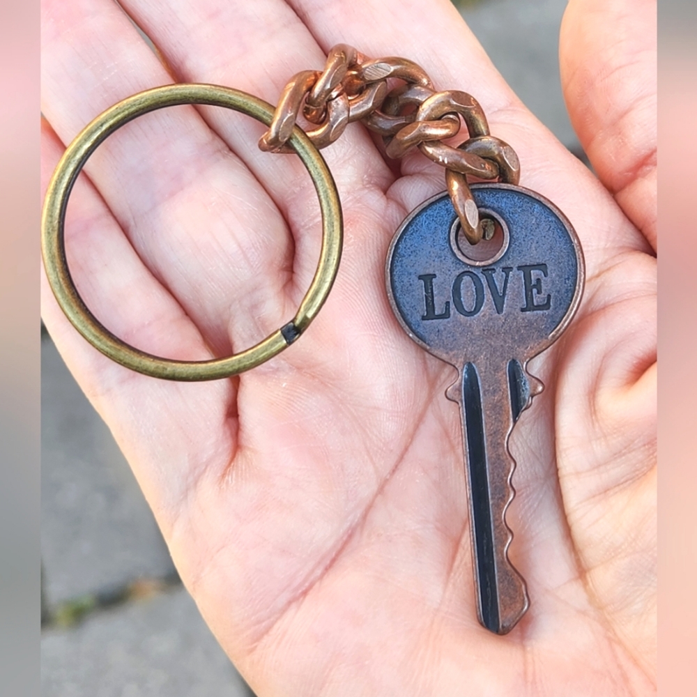 Anthropologie "Love is the Key" Antiqued Brass Keychain